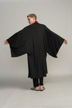 "Japanese Haori Jacket, Kimono Oversize Cardigan, Grey Urban Casual to Evening Bohemian Black Cape Cover Up This great Gray Unisex Japanese Haori kimono Jacket is a very chic addition to your wardrobe and upgrades any outfit. The Haori Kimono can be combined with most of your outfits, be it Pants, Jumpsuits, and skirts. This Haori is suitable for men and Women and is made from high-quality Lycra. MEASUREMENTS OF THE HAORI:ONE SIZE BODY PART: Bust - 126cm / 49\" inches Hips - 126 cm / 49\" inches Fall Kimono With Relaxed Fit And Kimono Sleeves, Fall Kimono With Relaxed Fit For Loungewear, Fall Layering Kimono With Kimono Sleeves, Black Open Front Kimono For Fall, Black Oversized Bohemian Cape, Fall Season Relaxed Fit Wrap Kimono, Long Fall Kimono With Relaxed Fit, Oversized Kimono For Fall Layering, Long Relaxed Fit Kimono For Fall