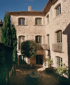 an outside view of a building with many windows