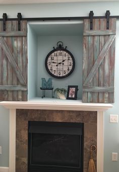 a fireplace with a clock on the mantle