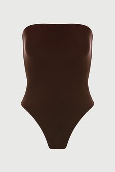 Far from basic. Our form-conscious bodysuit features a straight neckline and our signature double-lined fabric for a close, comfortable fit that won’t slip or chafe. Finished with a thong back and snap closure for seamless styling versatility. NW Collection Import 95% Viscose, 5% Spandex Model wears size X-Small True to size This bodysuit is double-lined All Bodysuits Are Final Sale Basic Bodysuit, Naked Wardrobe, Straight Neckline, Womens Bodysuit, Denim Pants, Snap Closure, Jumpsuit Dress, Your Style, Final Sale