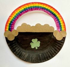 a paper plate with a pot of gold craft on it