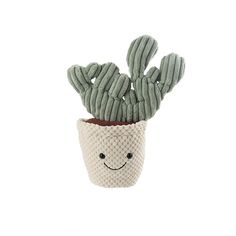 a small cactus in a white pot with a smiley face drawn on it's side