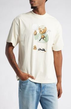 A dapper bear brings signature sporty energy to a graphic T-shirt cut from comfortable cotton in a classic fit. Crewneck Short sleeves 100% cotton Dry clean Imported T Shirt Cut, Favorite Daughter, Blazer With Jeans, Maternity Shops, Suit Separates, Cut Tshirt, Designer Clothes For Men, Modern Outfits, Free Fabric