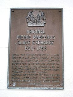 a plaque on the side of a building that says original pierre masperos slave exchange