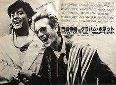 an old japanese magazine with two men laughing