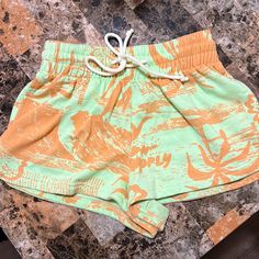 Get Ready For Warmer Months With These Cute Mint Green And Burnt Orange Cotton Shorts From Urban Outfitters Size Xs (With Some Stretch And A Very Elastic Waistband With Drawstring). They Feature A Fun Tropical Print That Screams Time For A Vacaaaaation! These Shorts Are Like New, Though Tags Have Been Removed. The Actual Brand (Though Purchased At Uo) Is “Out From Under”. Orange Bottoms With Built-in Shorts For Loungewear, Beachwear Cotton Shorts For Leisure, Orange Beachwear Shorts For Beach Season, Orange Beach Shorts, Summer Orange Shorts With Built-in Shorts, Orange Vacation Shorts With Elastic Waistband, Orange Loungewear Bottoms With Built-in Shorts, Yellow Drawstring Shorts For Summer, Beachy Cotton Shorts With Drawstring