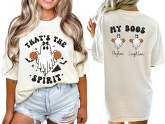 Show off your cheer spirit with our Cheerleader "that's the spirit" shirt, featuring an adorable cheerleading ghost with pom poms in hand and personalized with the cheerleader names on back. Perfect for fall and halloween, this shirt is an ideal gift for any proud cheer mom, aunt, grandma, dad or fan. COMFORT COLORS 1717 SHIRT: Unisex 100% US cotton - ethically grown and harvested Pre-Shrunk Fabric Relaxed Fit - Size up for a trendy oversized look Seamless Sides Double Needle Stitching Garment-d Halloween Cheer Shirts, Custom Cheer Shirts, Cheer Mom Gifts, Cheer Coach Shirts, Cheer Mom Shirt, Cheer Spirit, Cheerleading Shirts, Cheer Shirt, Cheer Ideas