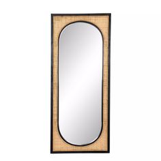 a mirror that is sitting on top of a wall with a wood frame and black trim