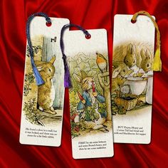 three bookmarks with pictures of rabbits on them