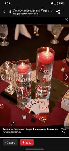 a table with candles and cards on it