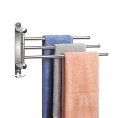 three towels are hanging on a towel rack