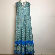 Stylish Bohemian Maxi Dress Lace Up Neckline Hawaii Breeze Combo Size S Dress Runs Large New With Tags Sleeveless Blue Maxi Dress With Boho Print, Blue Flowy Hippie Dresses, Blue Boho Print Flowy Midi Dress, Blue Flowy Boho Tunic Dress, Flowy Blue Boho Print Midi Dress, Blue Flowy Tunic Boho Dress, Blue Maxi Boho Dress For Festivals, Blue Bohemian Midi Dress With Boho Print, Turquoise Sleeveless Bohemian Dress