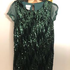 Cute Green Sparkly Dress Any Occasion. Green Sequined Short Sleeve Dress, Green Short Sleeve Dress For Formal Occasions, Green Mini Dress For Holiday, Festive Spring Mini Dress With Short Sleeves, Festive Short Sleeve Mini Dress For Spring, Green Short Sleeve Dress For Holiday, Holiday Dresses With Sequins And Short Sleeves, Green Sparkly Dress, Jean Dresses