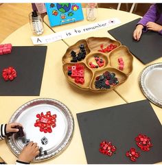 children are playing with magnets on the table