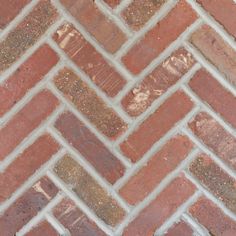 an image of a brick wall that looks like it is made out of red bricks