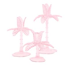 three pink vases with palm trees on them