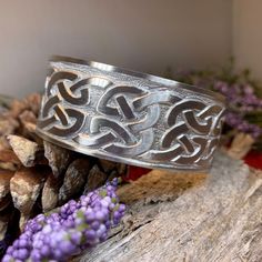 TAKE AN ADDITIONAL 20% OFF THE ALREADY REDUCED SALE PRICE - ADDITIONAL 20% IS DEDUCTED AT CHECKOUT with code SAVE20 Stunning! Our lead & nickle free Pewter Celtic Knot Bangle Bracelet features an ancient Celtic weave design that goes back thousands of years, embraced on both sides by a Celtic knot work pattern. Made of heavy, solid pewter that will never tarnish and designed to last a lifetime. A beautiful gift! Bracelet is in the cuff style with an open back and can be adjusted for almost any w Celtic Knot Work, Celtic Knot Bracelet, Celtic Weave, Knot Bangle, Work Pattern, Gift Bracelet, Knot Bracelet, Crystal Design, Celtic Jewelry