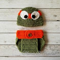 a crocheted frog hat and diaper cover on a white wooden background with text overlay that says, ` `