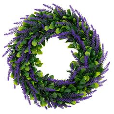 a wreath with purple flowers and green leaves