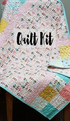 a quilt kit sitting on top of a wooden chair