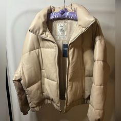 New With Tags! Soft Vegan Leather That Is Wind And Water Resistant. Color Is Light Taupe. Size Xl Cream Puffer Outerwear For Cold Weather, Cream Puffer Jacket With Padded Collar For Fall, Cream Casual Puffer Jacket For Fall, Casual Cream Puffer Jacket For Fall, Chic Beige Puffer Outerwear, Black Faux Fur Jacket, Green Utility Jacket, Blazer Beige, Womens Parka