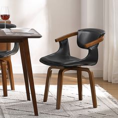 Introduce mid-century modern charm to your dining space with the Art Leon Swivel Dining Chair. Crafted with a sturdy wood frame and faux leather upholstery, this chair features a recessed armrest design and a suspended curve back for added comfort. Chair For Bedroom, Swivel Dining Chairs, Printed Chair, Swivel Accent Chair, Vanity Chair, Mid Century Dining Chairs, Ideas Casa, Wood Structure, Mid Century Dining