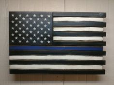 an american flag made out of thin blue line wood