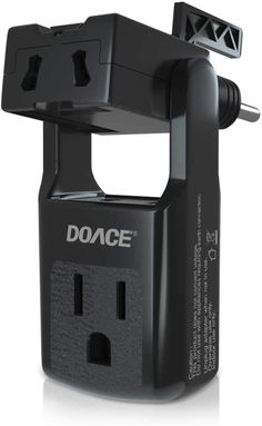 a black device holder with two outlets on it