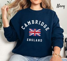 Cambridge Sweatshirt,  England Sweatshirt, UK Sweatshirt, Cambridge Unisex Heavy Blend Crewneck Sweatshirt Ideal for any situation, a unisex heavy blend crewneck sweatshirt is pure comfort. Garments are made from polyester and cotton. This combination helps designs come out looking fresh and beautiful. The collar is ribbed knit, so it retains its shape even after washing. There are no itchy side seams on these sweaters. - 50% Cotton 50% Polyester - Medium-heavy fabric (8.0 oz/yd² (271.25 g/m - C Uk Sweatshirt, University Shirt, Cambridge, Unisex Sweatshirt, Pretty Outfits, Crewneck Sweatshirt, Sweat Shirt, Quality Fabric, Ribbed Knit