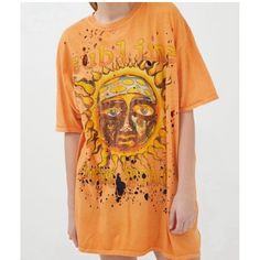 This Urban Outfitters X Sublime Distressed Holes Oversized Women Tee Tshirt In Size S/M Is Perfect For Casual Occasions. The Crew Neck And Short Sleeves Provide Comfort, While The Pullover Closure Makes It Easy To Wear. The Orange/Multicolor Cotton Material Is Machine Washable And Breathable, Making It Suitable For All Seasons. The Relaxed Fit And Casual Sleeve Type Add To The Comfortable And Laid-Back Style Of The T-Shirt. The Heavy Metal, Rock, Punk, Vintage, Music, Ska, Steampunk, Retro, And Cotton Tshirts For Women, Oversized Band Tshirt Dress, Affordable Retro T-shirt From Urban Outfitters, Hippie Inspired Shirts, Vintage Womens Tshirt, Cheap Oversized Graphic Tee, All Over Print Tshirt Women, Vintage Hippie Shirts, Sunny Tee Shirts