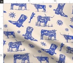 a blue and white cow pattern on a cream background