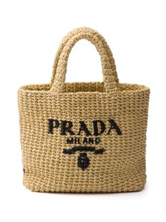 sand beige/jet black straw interwoven design embroidered logo to the front open top flat top handles main compartment This piece comes complete with a protective dust bag. This piece comes with a certificate of authenticity. Crochet Logo, Crochet Handles, Raffia Crochet, Prada Tote Bag, Embroidered Tote Bag, Embroidered Tote, Fabric Tote Bags, Straw Tote Bag, Lettering Logo