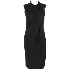 Gucci black jersey knit sleeveless draped shift cocktail dress. Crew neckline. Front crisscrossed drape detail with rectangular gold-toned metal brooch. Sleeveless. Shift style. Center back invisible zipper with hook and eye closure at top. Fully lined. Unmarked Fabric Content: Rayon. Measurements: Shoulder: 14" (seam to seam) Chest: 30" (armpit to armpit; unstretched) Waist: 27" (measured 6" below chest; unstretched) Hip: 30" (measured 6" below waist; unstretched) Total Length: 40.5" (center ba Gucci Jersey, Cocktail Dress Classy, Cocktail Dress Black, Black Jersey, Gucci Black, Jewelry Vintage, Classy Dress, Antique Furniture, Shift Dress