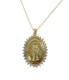 This 14K gold, large, diamond miraculous medal necklace will turn heads with its beautiful sparkle. Weighing in at 1.05cts t.w. in natural diamonds, the mesmerizing diamonds are sure to leave a lasting impression. Let the exquisite craftsmanship of this unique necklace speak for itself! Details: Quality & Nature of Diamonds: H-I Color, VS2-SI1 Clarity, Natural gemstone Medal Dimensions only with diamonds: 26.0mm (L) X 20.0mm (W) Medal Dimensions with bail: 34.0mm (L) X 20.0mm (W) This medal come Yellow Gold Miraculous Medal Oval Pendant Necklace, Yellow Gold Oval Pendant Necklace With Miraculous Medal, Gold Diamond Necklace With Brilliant Cut Oval Pendant, Gold Oval Diamond Necklace Hallmarked, Gold Necklace With Oval Pendant, Gold Diamond Necklace With Oval Pendant Accents, Elegant Oval Necklace With Miraculous Medal, Oval Miraculous Medal Necklace For Anniversary, Anniversary Oval Necklace With Miraculous Medal