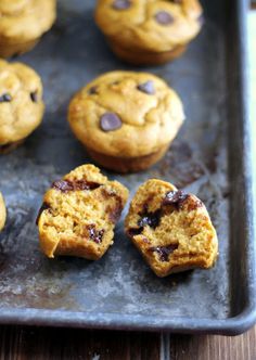 chocolate chip muffins on a baking tray ready to be eaten