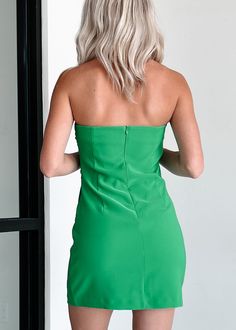 SELF: 92% POLYESTER, 8% SPANDEX. LINING: 100% POLYESTER Model Wearing Size Small Color: Kelly Green Strapless Neckline - With Silicone Grip Lining Ruched Detail Asymmetric/Faux Wrap Design Lined Back Zipper Closure Mini Length Fabric Has Some Stretch 24" Armpit To Hemline For Model Size Specs Please Check Size Charts Launched: 5/22/24 Green Hoco Dresses, Kelly Green Dresses, Green Dresses, Strapless Neckline, Dresses Cheap, Strapless Mini Dress, Hoco Dresses, Cheap Dresses, Kelly Green