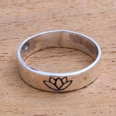 Lotus Flower Sterling Silver Band Ring from Bali - Single Lotus | NOVICA Rose Quartz Bracelet Beads, Metal Stamped Jewelry, School Jewelry, Sterling Silver Rings Bands, Stamping Ideas, Silver Band Ring, Pretty Rings, Stamped Jewelry, Sterling Silver Bands