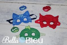 three masks with different colors and designs on them