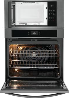 an oven with the door open and its light on, showing it's interior