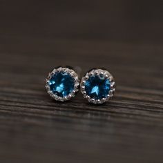 It is a pair of London blue topaz earring. The main stone is 4mm*4mm round cut. The basic metal is sterling silver and plated with rhodium. To change the metal to a solid gold (white/rose) or platinum is also available, please ask for a quotation if you want. You can also go to my shop Home for more elegant jewelries: https://www.etsy.com/shop/godjewelry?ref=hdr_shop_menu More jewelries: https://www.etsy.com/shop/godjewelry?ref=l2-shop-header-avatar Customization is always welcome and please fee Blue Topaz Birthstone Round Earrings, Blue Topaz Birthstone Earrings, Sapphire Blue Topaz Round Earrings, Blue Topaz Round Earrings For Anniversary, Blue Round Topaz Earrings, White Gold Earrings With Blue Topaz Birthstone, Blue Topaz Birthstone Earrings For Anniversary, Anniversary Blue Topaz Birthstone Earrings, Blue Topaz Round Earrings