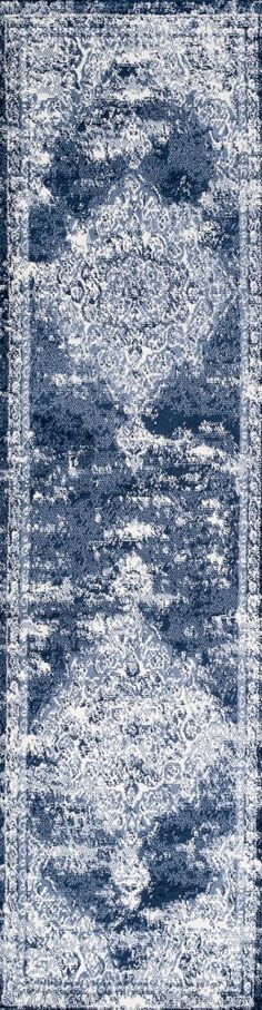 an area rug with blue and white colors