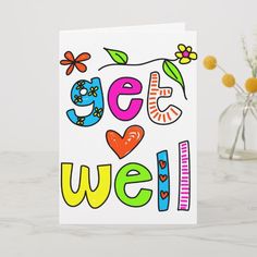 a greeting card with the words get well written in colorful letters and flowers on it