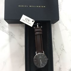 Never Worn Men’s Black Face Dark Brown Strap. Sticker Still On Face Of Watch...Including Box And Tag. Bought For My Boyfriend But I Bought The Wrong Size & Lost Return Labels And Receipt Brand New! Classic Brown Watch, Classic Brown Watch Accessories With Diamond Hour Markers, Classic Brown Leather Strap Watches, Classic Brown Quartz Watch, Modern Brown Watch Bands For Formal Occasions, Elegant Brown Watch For Work, Classic Brown Watch With Diamond Hour Markers, Brown Business Watches With Diamond Hour Markers, Timeless Brown Watch Accessories With Diamond Hour Markers