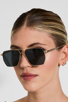 The Indi sunglass are sophisticated, polarized, square glasses with a metal frame. Includes cleaning cloth and flexible sunglasses case. Lense height: 4.7cm Lense measurement (nose arch to arm frame): 5.7cm Bridge: 1.27cm 170 Pounds, Devon Windsor, Black Splash, Polarized Glasses, Make A Choice, Square Glasses, 70s Inspired, Nose Bridge, New Arrival Dress