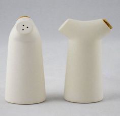 two white ceramic salt and pepper shakers