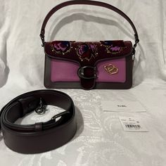 Coach Tabby Purple And Maroon Leather Handbag With Embellished Velvet Flap And Gold Hardware. Five Interior Pockets, One That Zips And One Slim Exterior Cell Phone Pocket. Please Message Me If You Have Any Questions. #Coach #Leather #Velvet #Floral #Gold #Purse Coach Tabby, Gold Purse, Purple Purse, Maroon Leather, Pretty Bags, Coach Bag, Coach Leather, Leather Handbag, Coach Bags