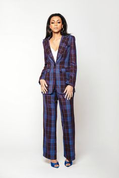 STYLE NOTES: The Sade pant is made from a soft and buttery 70s inspired plaid suiting. This high-rise pant is tailored with pressed pleats for a neat finish and falls to wide legs. A back elastic waist makes Sade a flattering choice. Pair with the matching blazer or an oversized sweater for a relaxed chick look 80% Polyester 20% Rayon Dry Clean Imported FIT NOTES: Model is 5'9" and wearing size X-Small High Waist Mid-weight, non-stretch fabric Fits true to size. Take your normal size Relaxed Fit Jackets Oversized, Blazer Suit Women, Polished Casual, Tapered Trousers, Peak Lapel, Tailored Blazer, High Rise Pants, 70s Inspired, Plaid Blazer