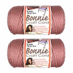 two balls of red yarn with the words bonnie and bonnie on them in white lettering