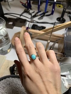 Simple American Mined blue turquoise set on 14k yellow gold. Solid 14k yellow gold fully hallmarked. 1.4mm band width. 8mmX 10mm Genuine North American turquoise. All of our jewelry will arrive in custom packaging ready for gift giving. LEAD TIME: Made to order will take 10-14 days. FOLLOW US ON: Instagram: @roseandchoc Facebook: /Roseandchoc Pinterest: @Roseandchoc Oval Turquoise Cabochon Ring In Yellow Gold, Oval Yellow Gold Turquoise Ring With Cabochon, Heirloom Oval Turquoise Cabochon Ring, Fine Jewelry Turquoise Oval Cabochon Ring, Handmade Turquoise Ring In Yellow Gold, Handmade Yellow Gold Turquoise Ring, Heirloom Yellow Gold Turquoise Cabochon Ring, Heirloom Style Oval Turquoise Gemstone Ring, Artisan Oval Jewelry With Bezel Setting