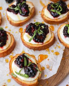 mini crostini with blueberries and cream cheese